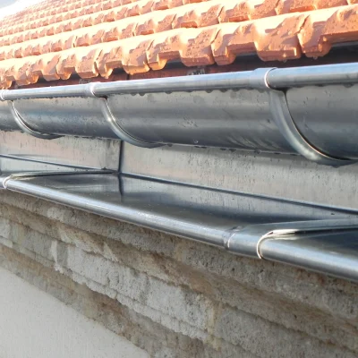 7 Pose de Gouttières Zinc